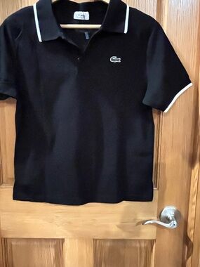 Brand new Lacoste Black Polo with White Trim and Crocodile (see measurements)